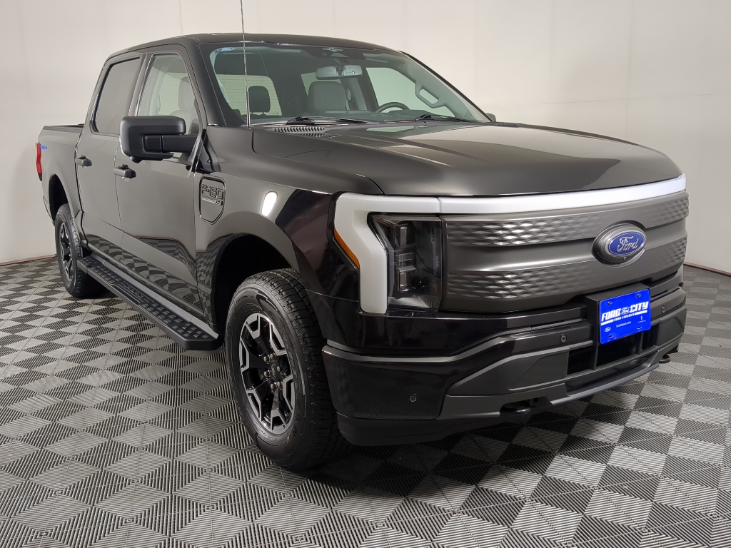 Used 2023 Ford F-150 Lightning XLT with VIN 1FTVW1EL6PWG52187 for sale in Champaign, IL
