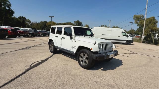 Used 2017 Jeep Wrangler Unlimited Sahara with VIN 1C4BJWEG4HL710043 for sale in Hales Corners, WI