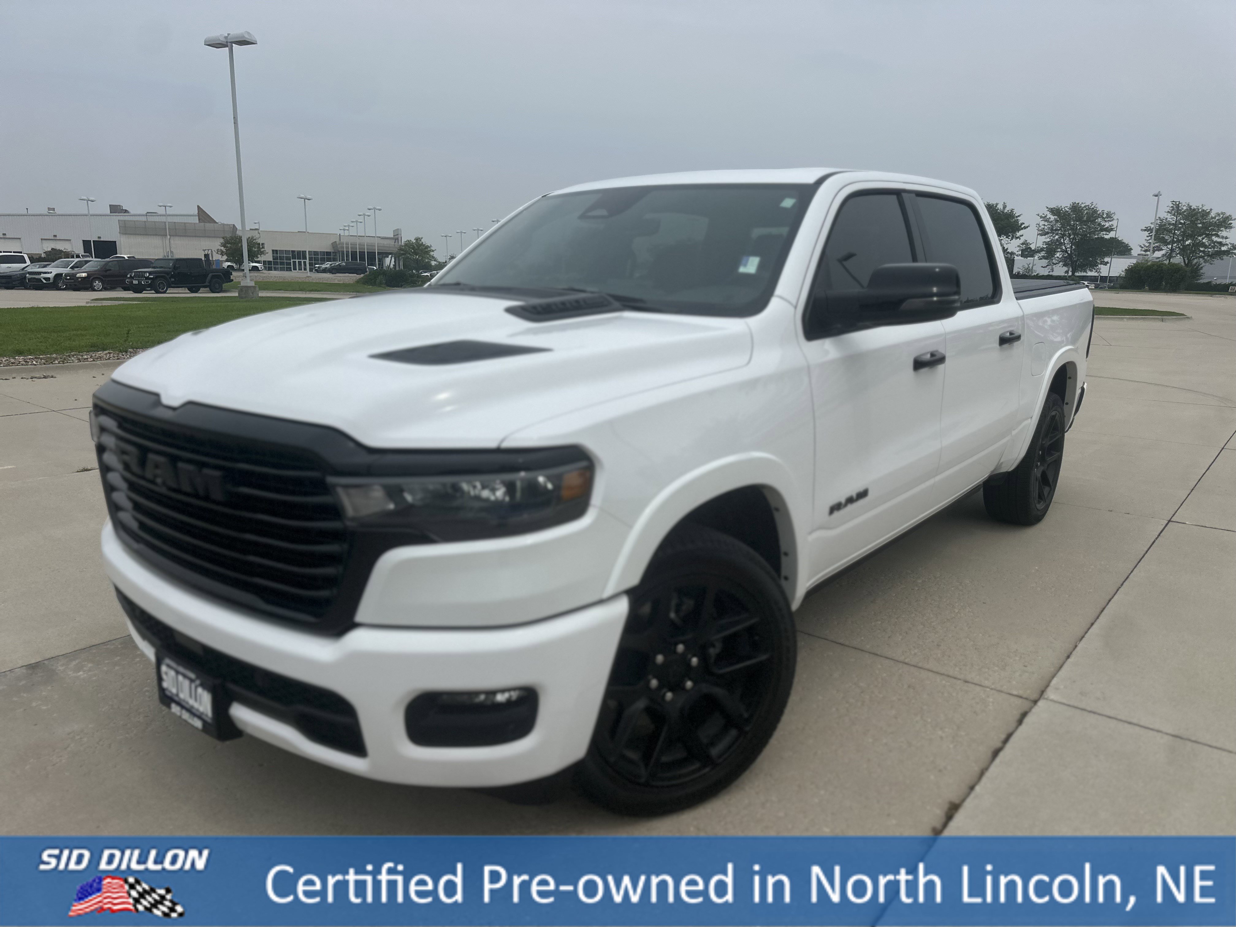 Used 2025 Bright White Clearcoat Ram Laramie image 1