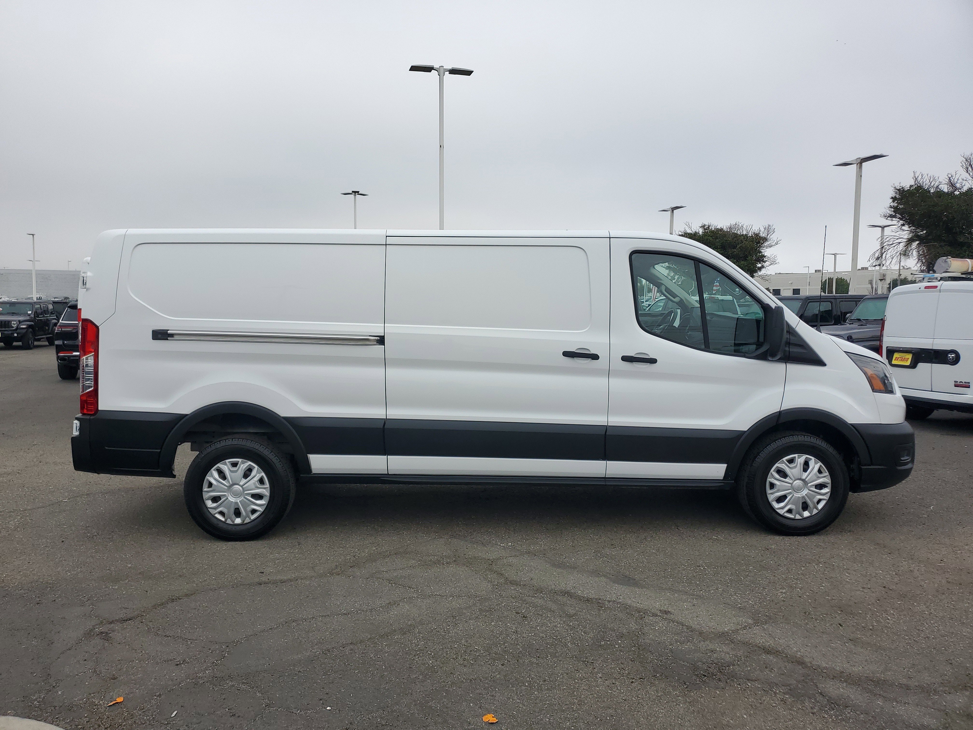 Used 2022 Ford E-Transit Cargo Van Base with VIN 1FTBW1YK3NKA21892 for sale in Fontana, CA