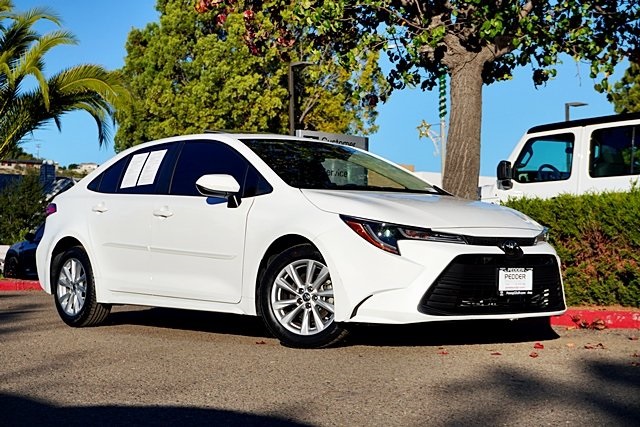 Used 2024 White Toyota LE image 1