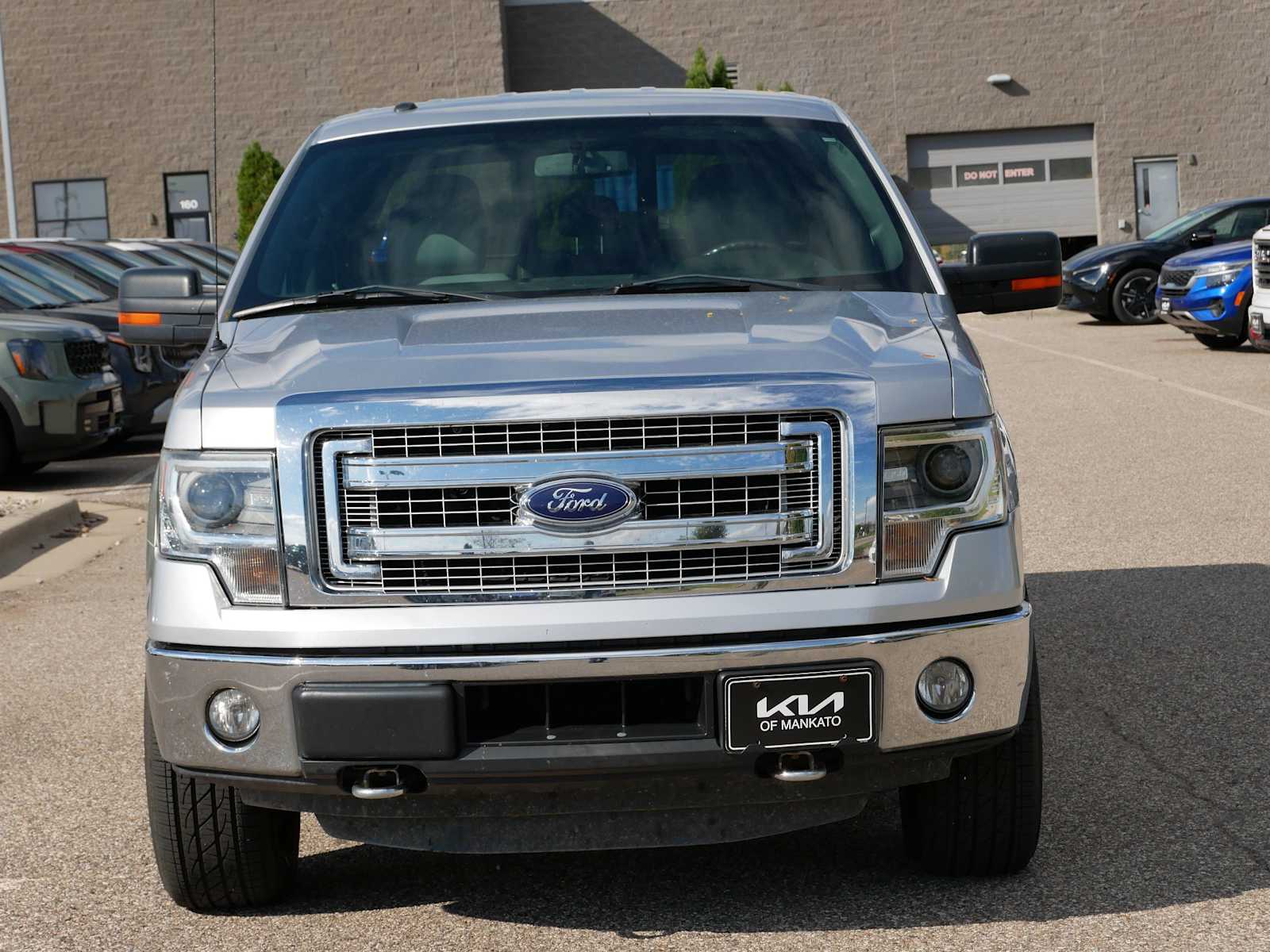 Used 2014 Ford F-150 XLT with VIN 1FTFW1ETXEFD10971 for sale in Mankato, Minnesota