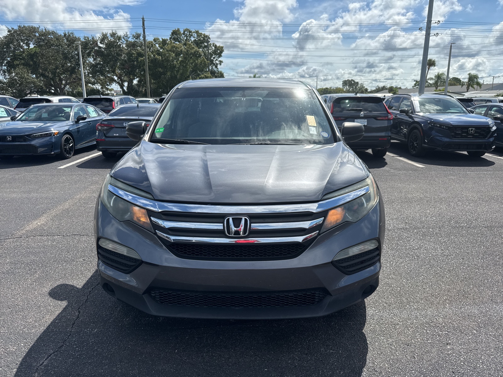 Used 2016 Honda Pilot LX with VIN 5FNYF5H1XGB050217 for sale in Port Richey, FL