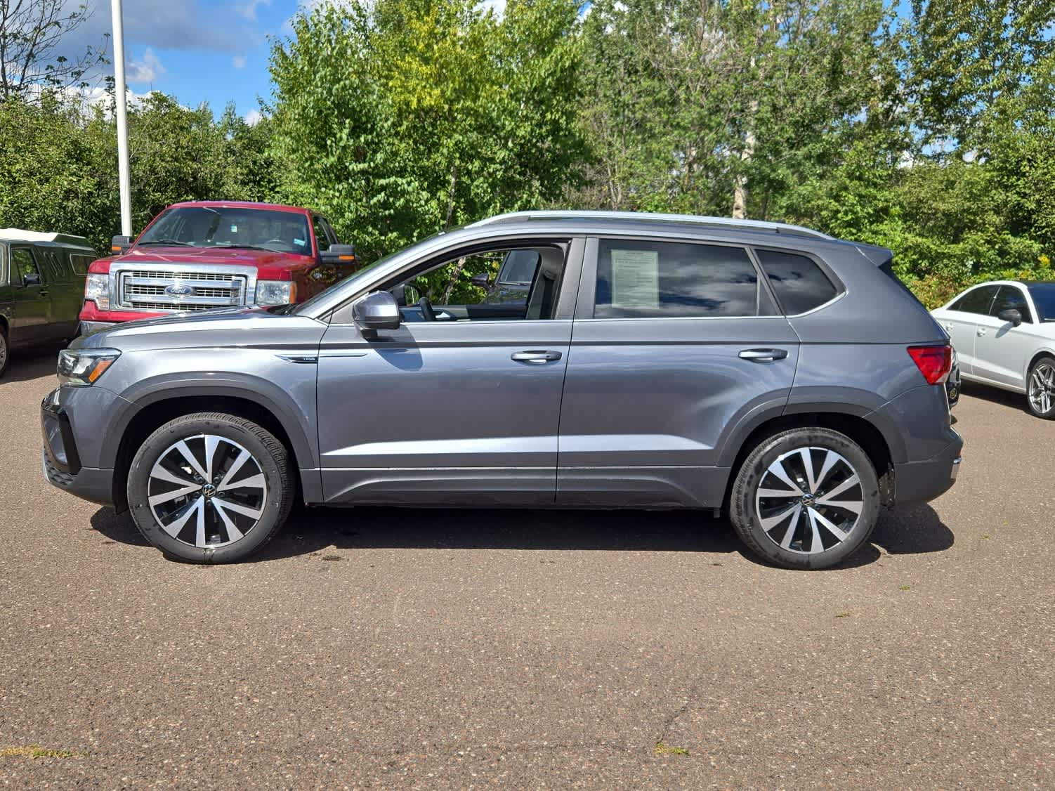 Certified 2023 Volkswagen Taos SE with VIN 3VVNX7B20PM309338 for sale in Hermantown, Minnesota