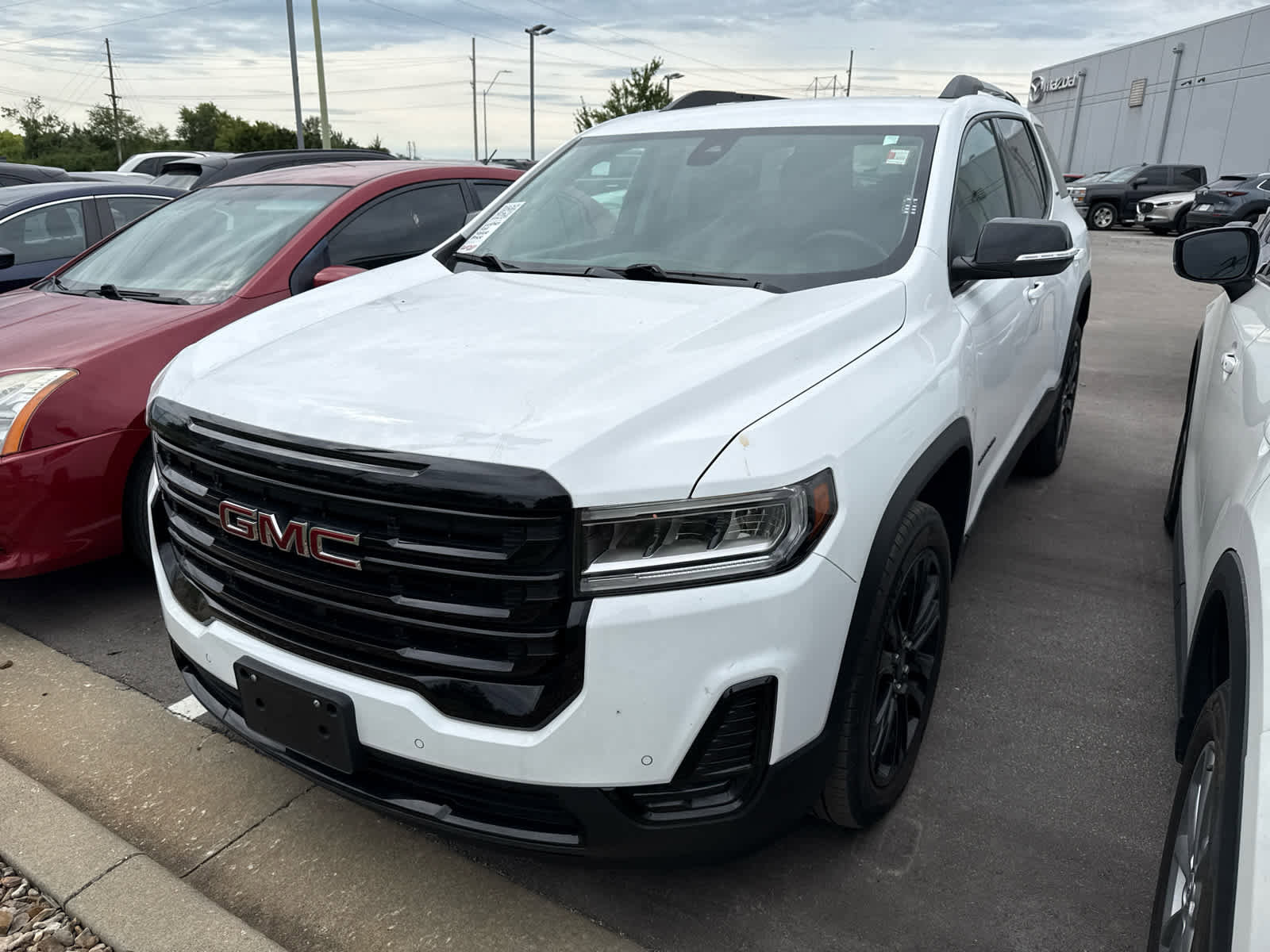 Used 2023 GMC Acadia SLE with VIN 1GKKNRL45PZ120108 for sale in Kansas City