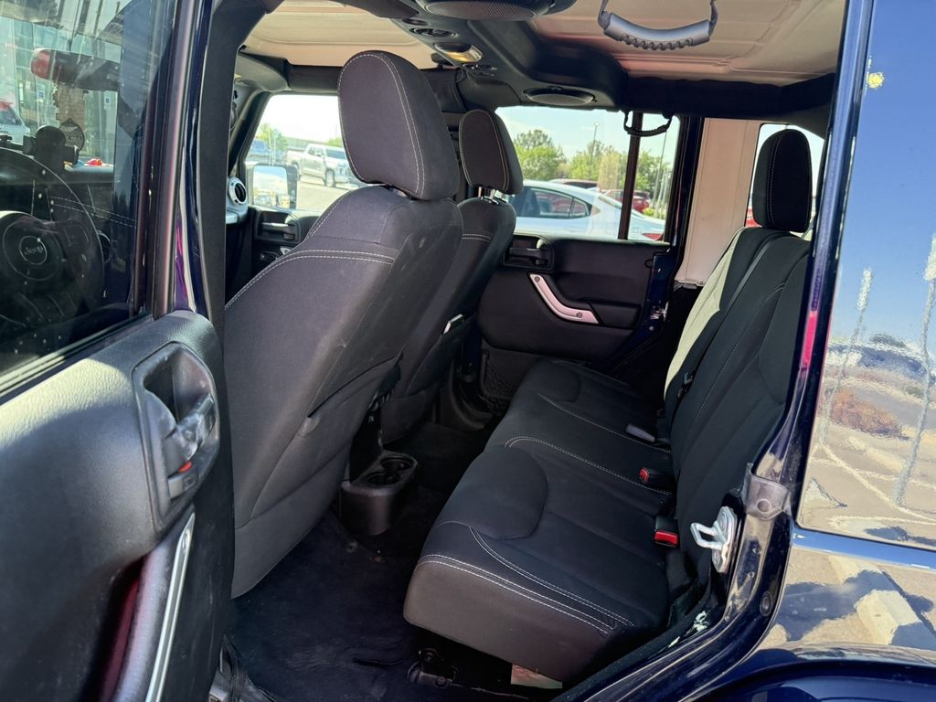 Used 2013 Blue Jeep Unlimited Sahara image 7