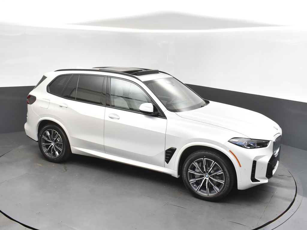 New 2026 Mineral White Metallic BMW xDrive50e image 1