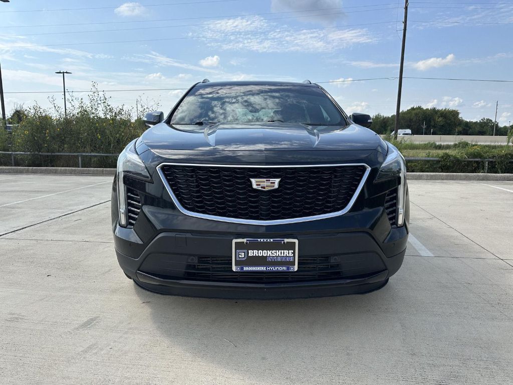 Used 2021 Cadillac XT4 Sport with VIN 1GYFZER45MF016615 for sale in Brookshire, TX