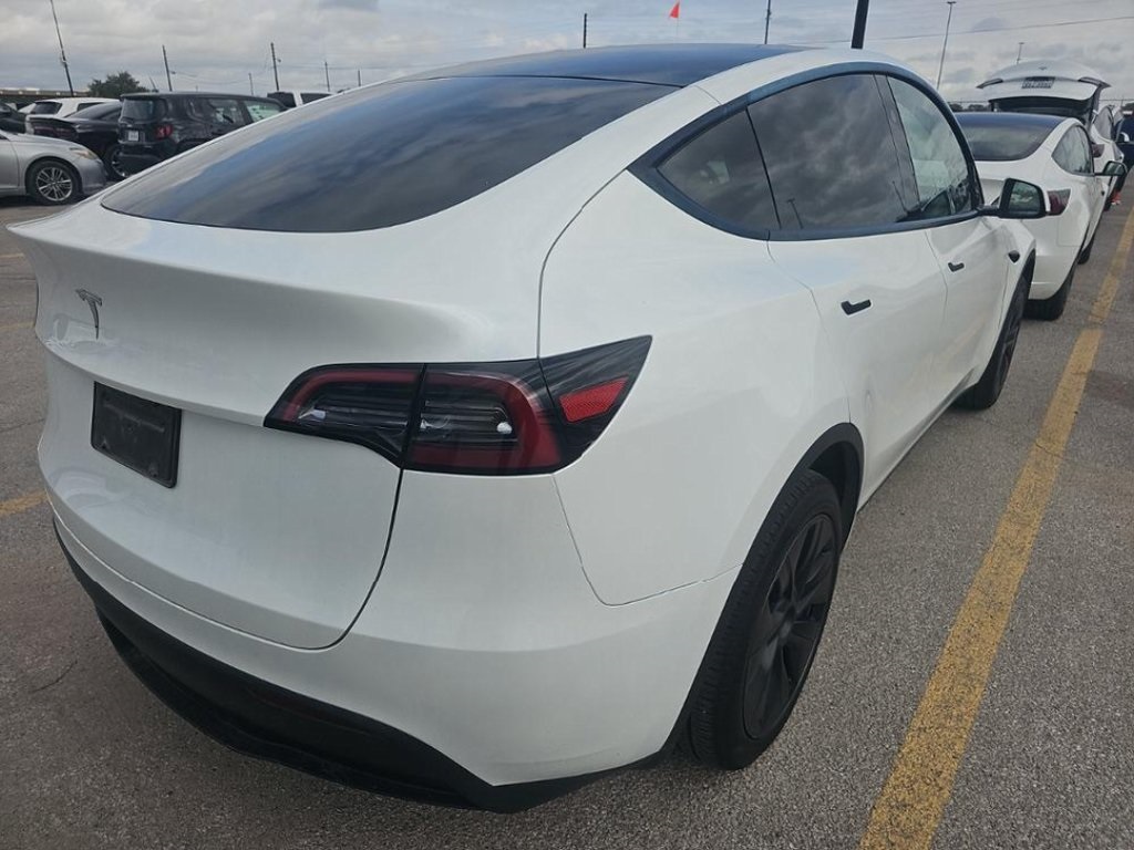 Used 2025 Tesla Model Y Long Range with VIN 7SAYGDEDXSA354467 for sale in Northfield, Minnesota