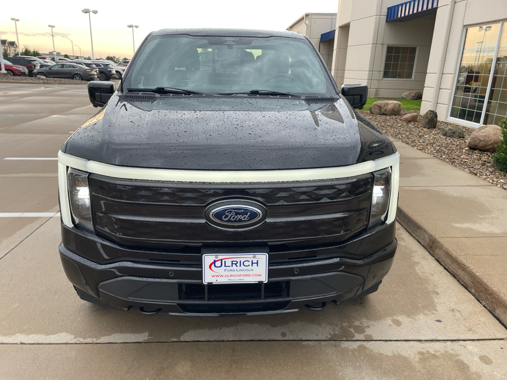 Used 2022 Ford F-150 Lightning Platinum with VIN 1FT6W1EV4NWG03508 for sale in Pella, IA