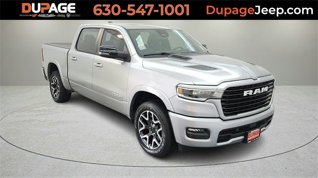 PRE-OWNED 2025 RAM 1500 LARAMIE WITH NAVIGATION & 4WD