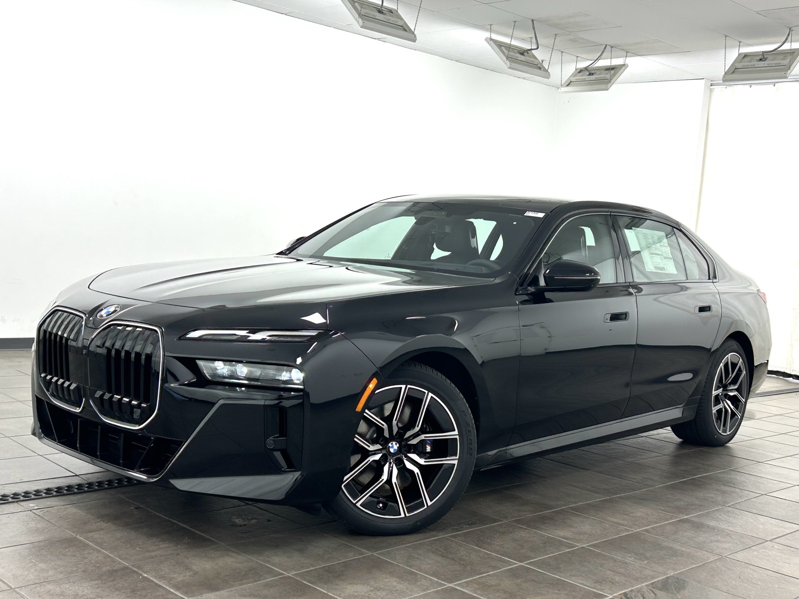 New 2025 Black BMW 740i xDrive image 1