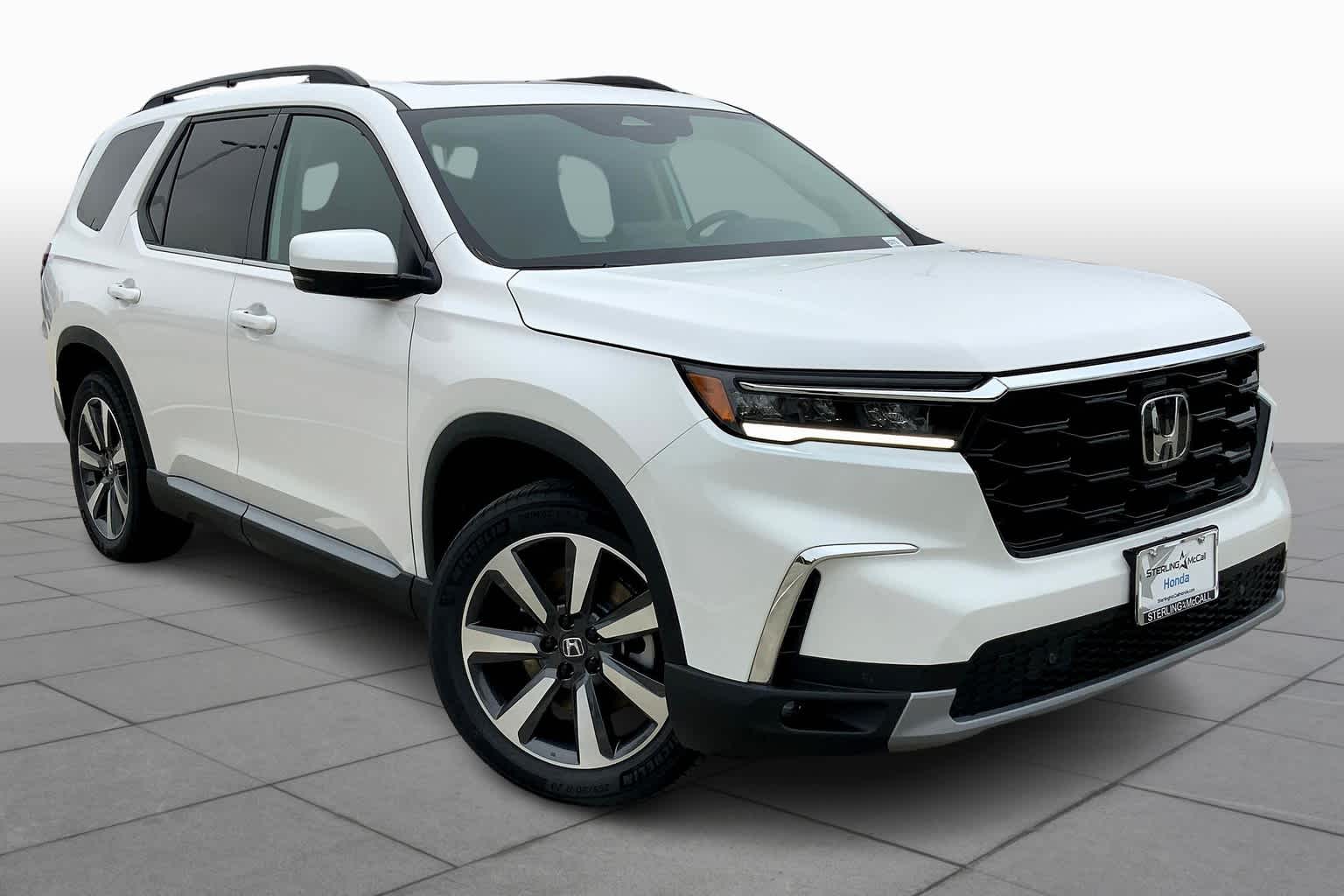 PreOwned 2024 Honda Pilot Touring Sport Utility in Houston RB012709