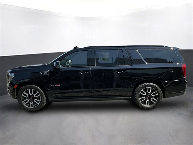 Used 2022 GMC Yukon XL AT4 with VIN 1GKS2HKLXNR123272 for sale in Kansas City