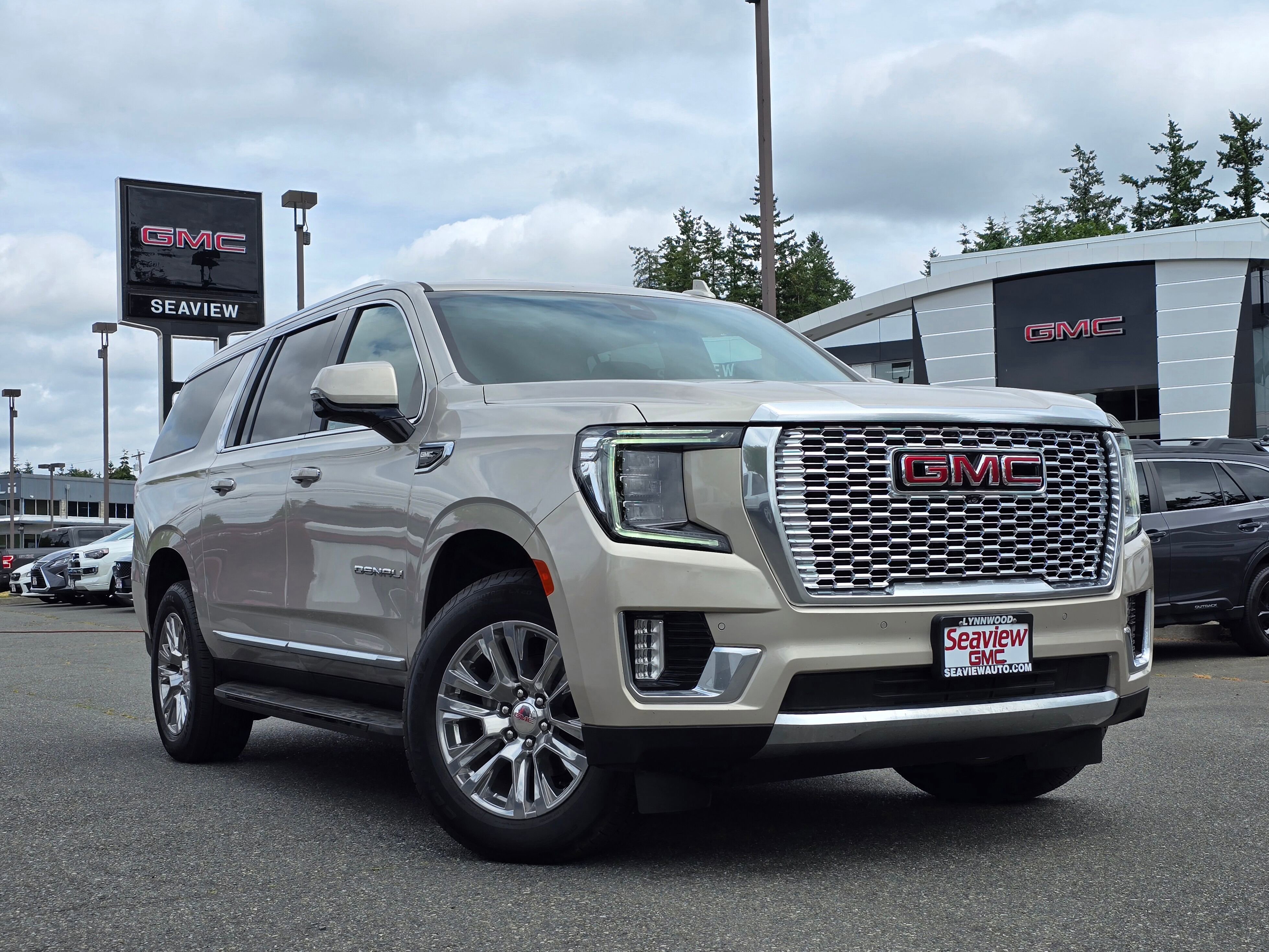 Used 2022 Pearl Beige Metallic GMC Denali image 1