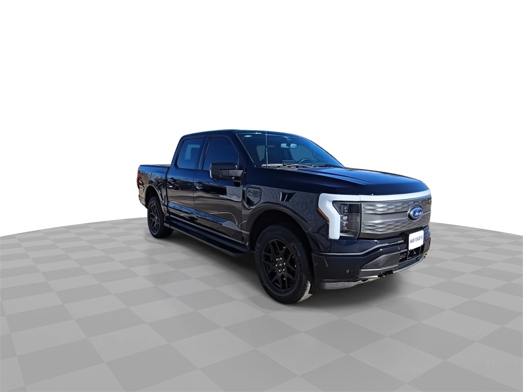Used 2023 Ford F-150 Lightning Lariat with VIN 1FT6W1EV0PWG50523 for sale in West Bend, WI