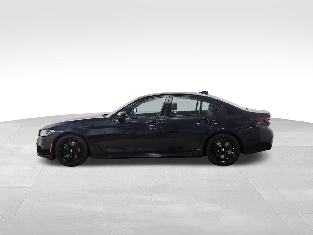 Used 2021 BMW 5 Series M550i with VIN WBA13BK0XMCG77968 for sale in Minneapolis, Minnesota