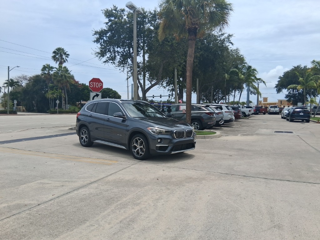 Used 2018 BMW X1 28i with VIN WBXHT3C37J5K21457 for sale in North Palm Beach, FL