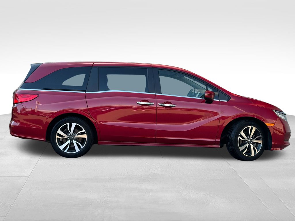 Used 2023 Honda Odyssey Touring with VIN 5FNRL6H8XPB010235 for sale in Coon Rapids, Minnesota
