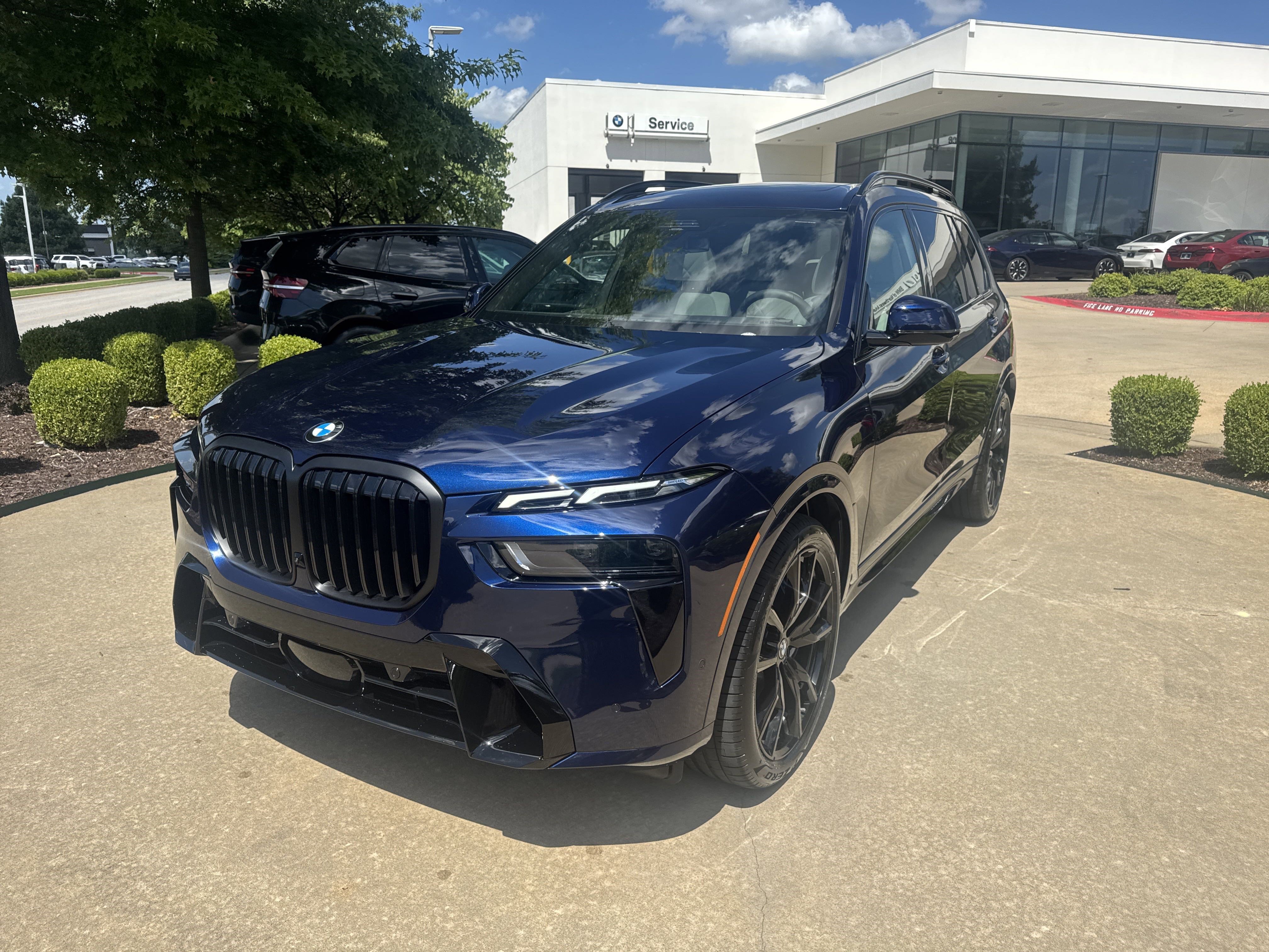 New 2026 0C3Z Tanzanite Blue II Metallic BMW xDrive40i image 1