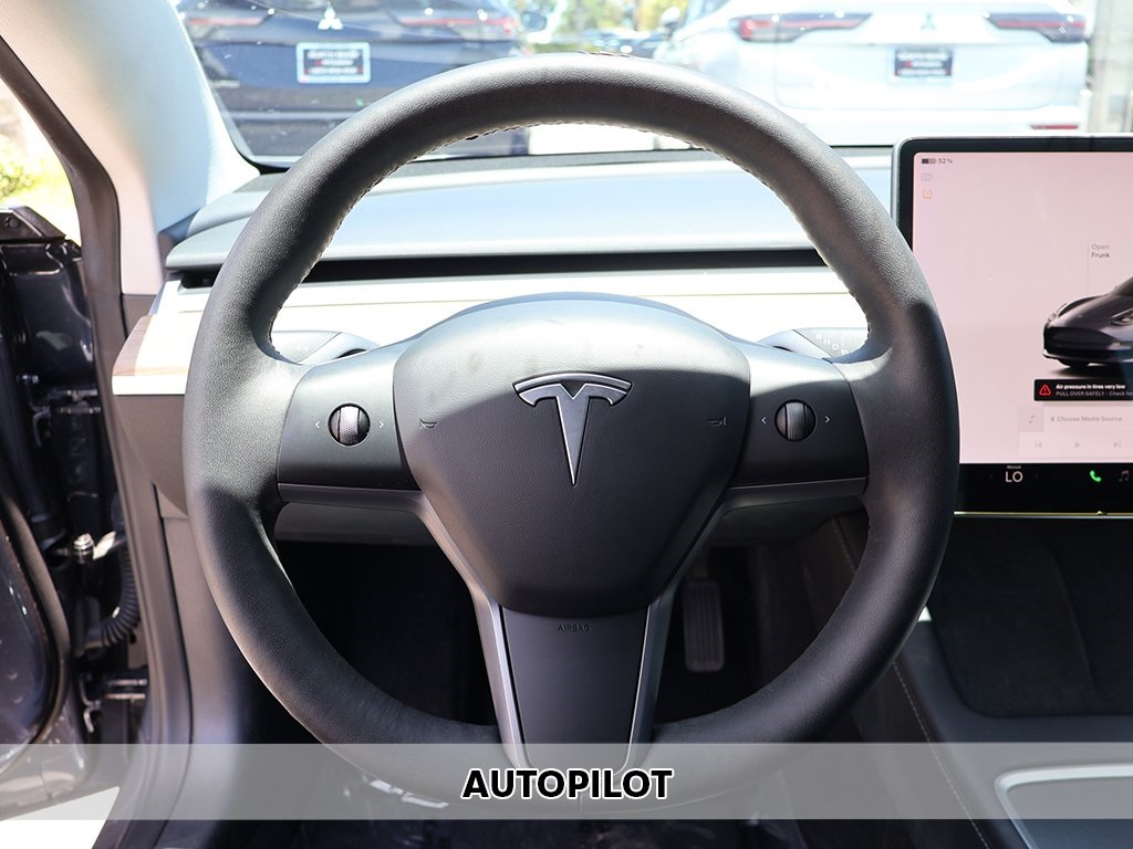 Used 2022 Tesla Model 3 Base with VIN 5YJ3E1EA4NF338483 for sale in Miami, FL