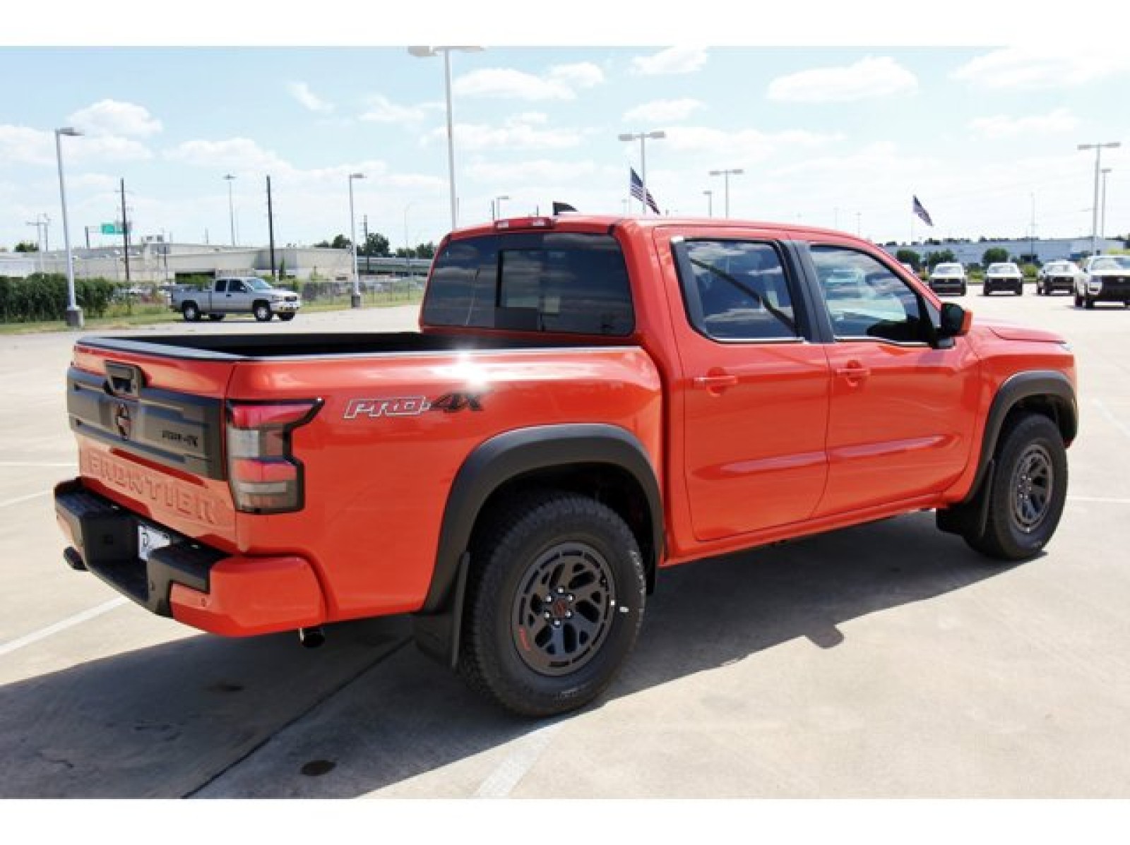 2025 Nissan Frontier Crew Cab PRO-4X® Orange at Robbins Nissan