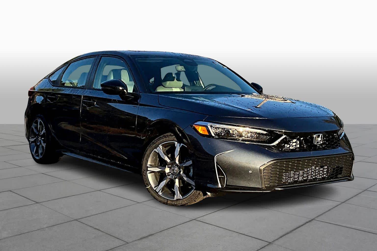 2026 Honda Civic Hatchback Touring Hybrid photo 2