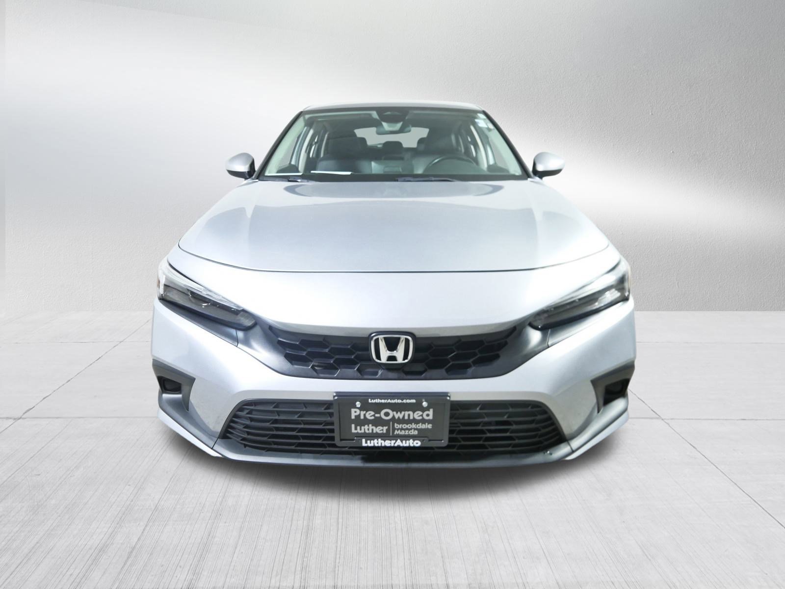 Used 2024 Honda Civic Hatchback EX-L with VIN 19XFL1H74RE012181 for sale in Brooklyn Center, Minnesota