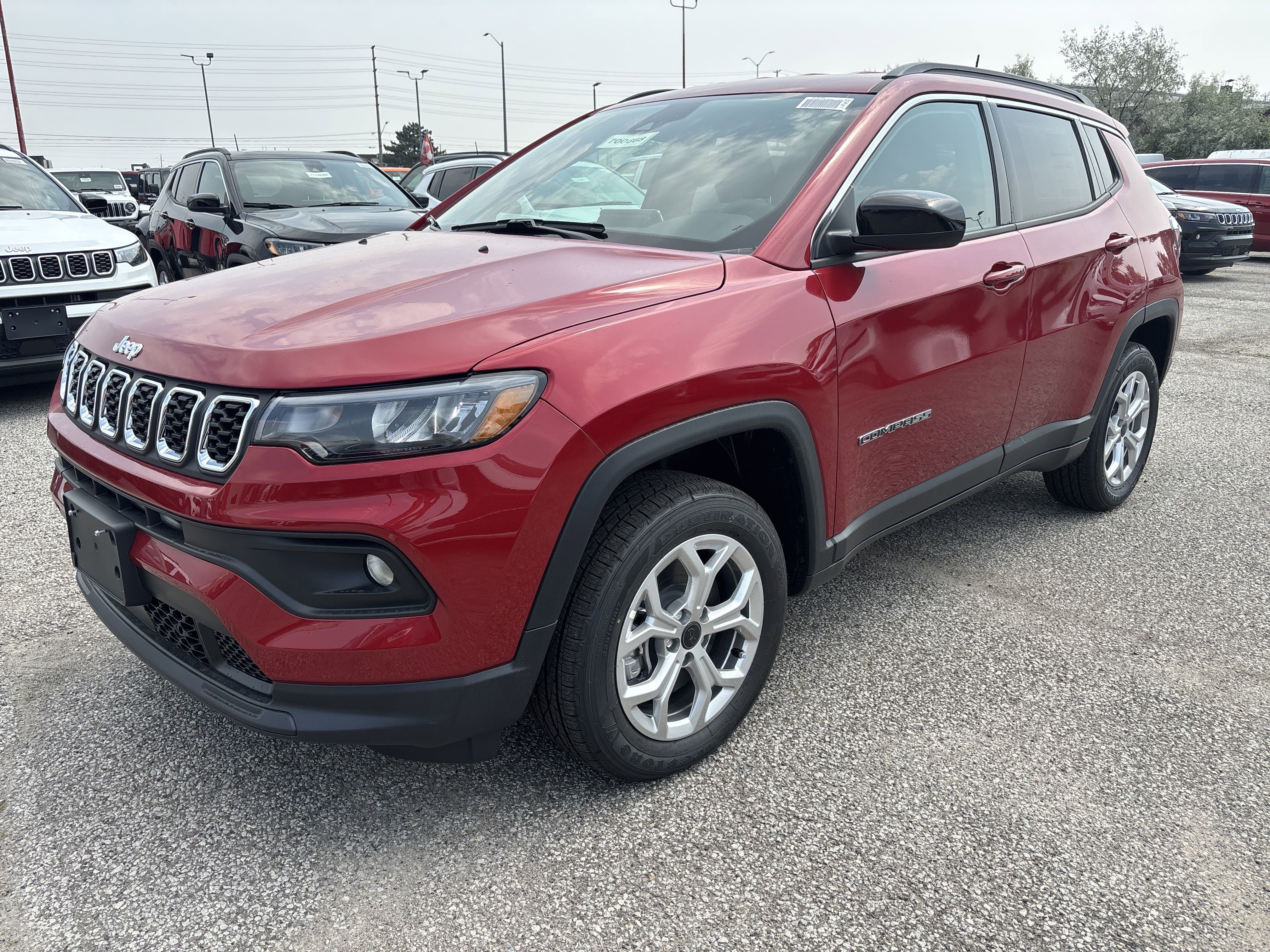 New 2025 Red Hot Pearl Jeep North image 1