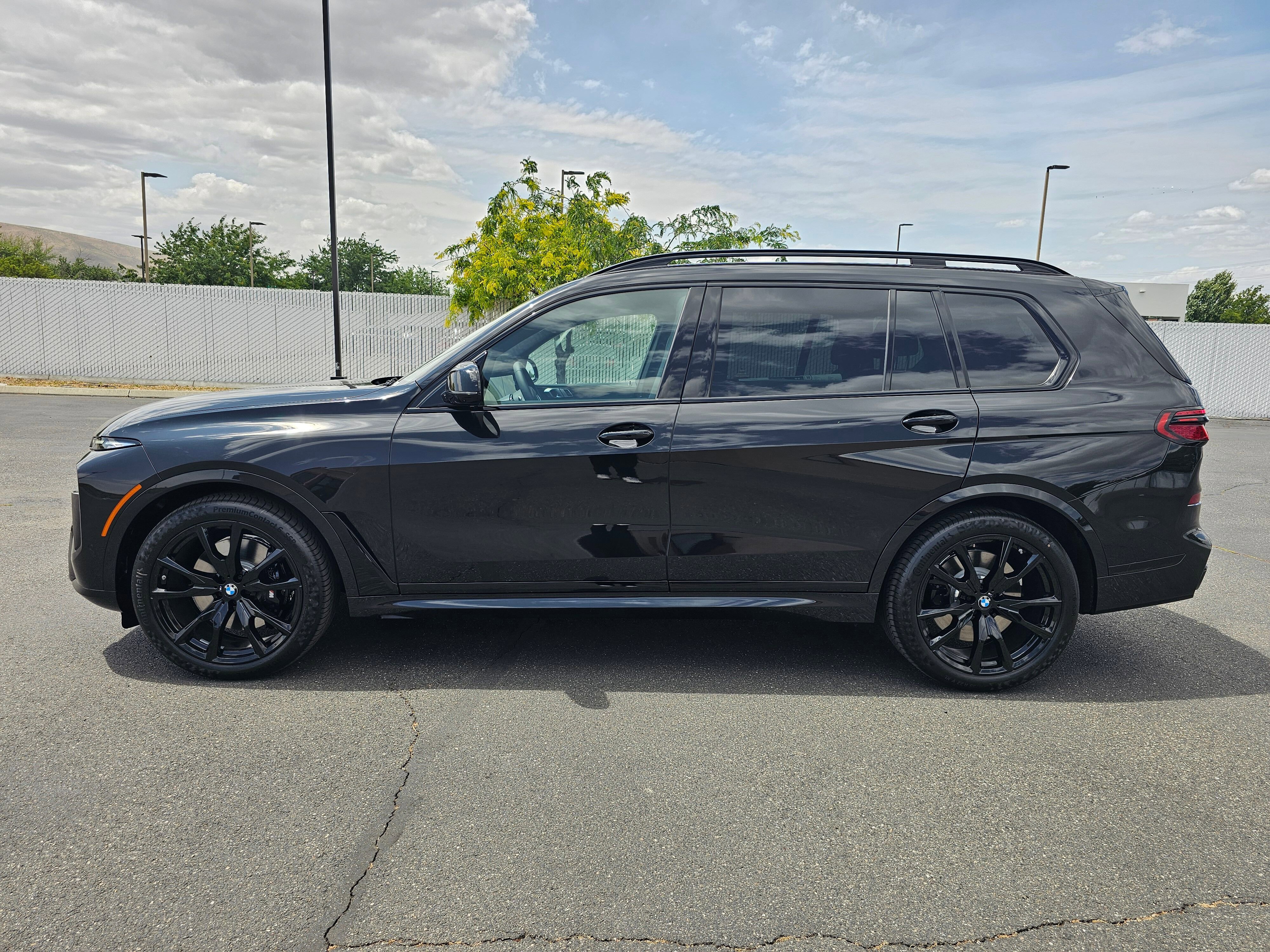 New 2026 Black Sapphire Metallic BMW M60i image 3