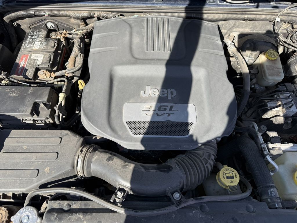 Used 2013 Blue Jeep Unlimited Sahara image 11