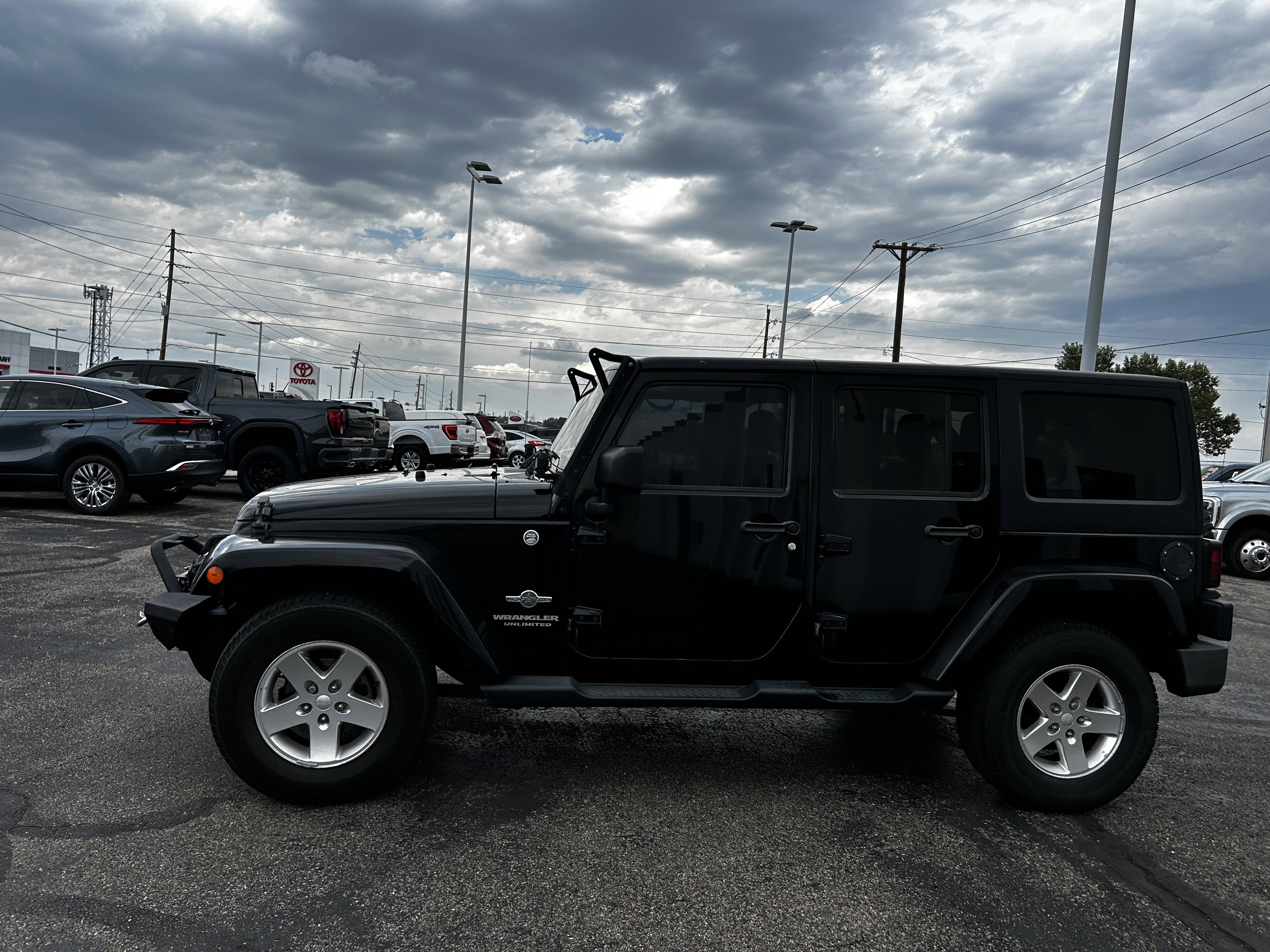 Used 2014 Jeep Wrangler Unlimited Sport with VIN 1C4BJWDG0EL229588 for sale in Cheyenne, WY
