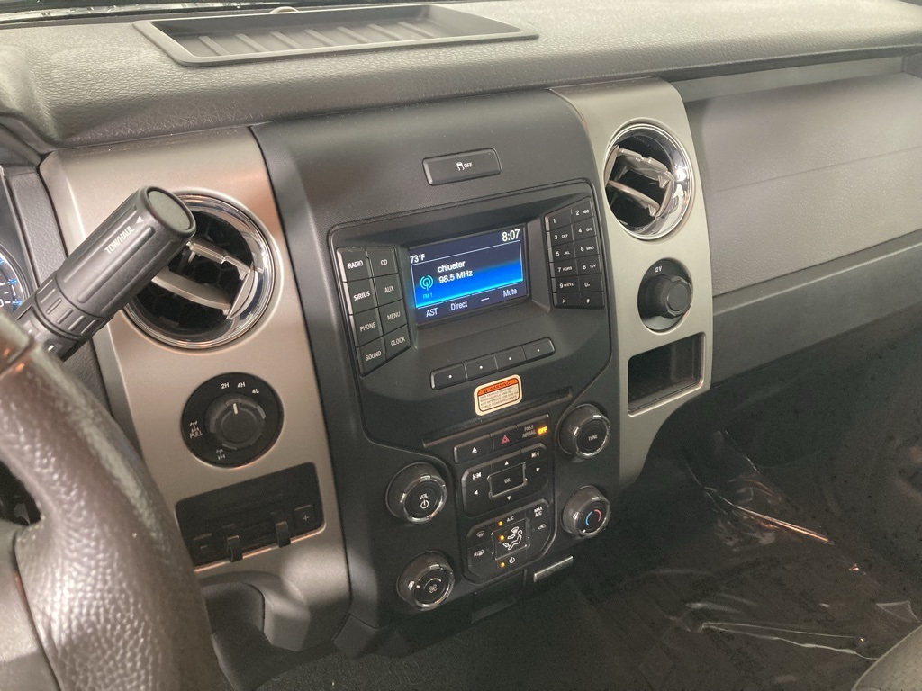 Used 2014 Ford F-150 XLT with VIN 1FTFW1EF4EKG57696 for sale in Elk River, Minnesota