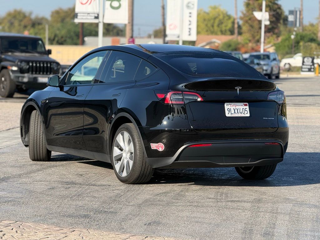 Used 2024 Tesla Model Y Long Range with VIN 7SAYGDEEXRF032112 for sale in Northfield, Minnesota