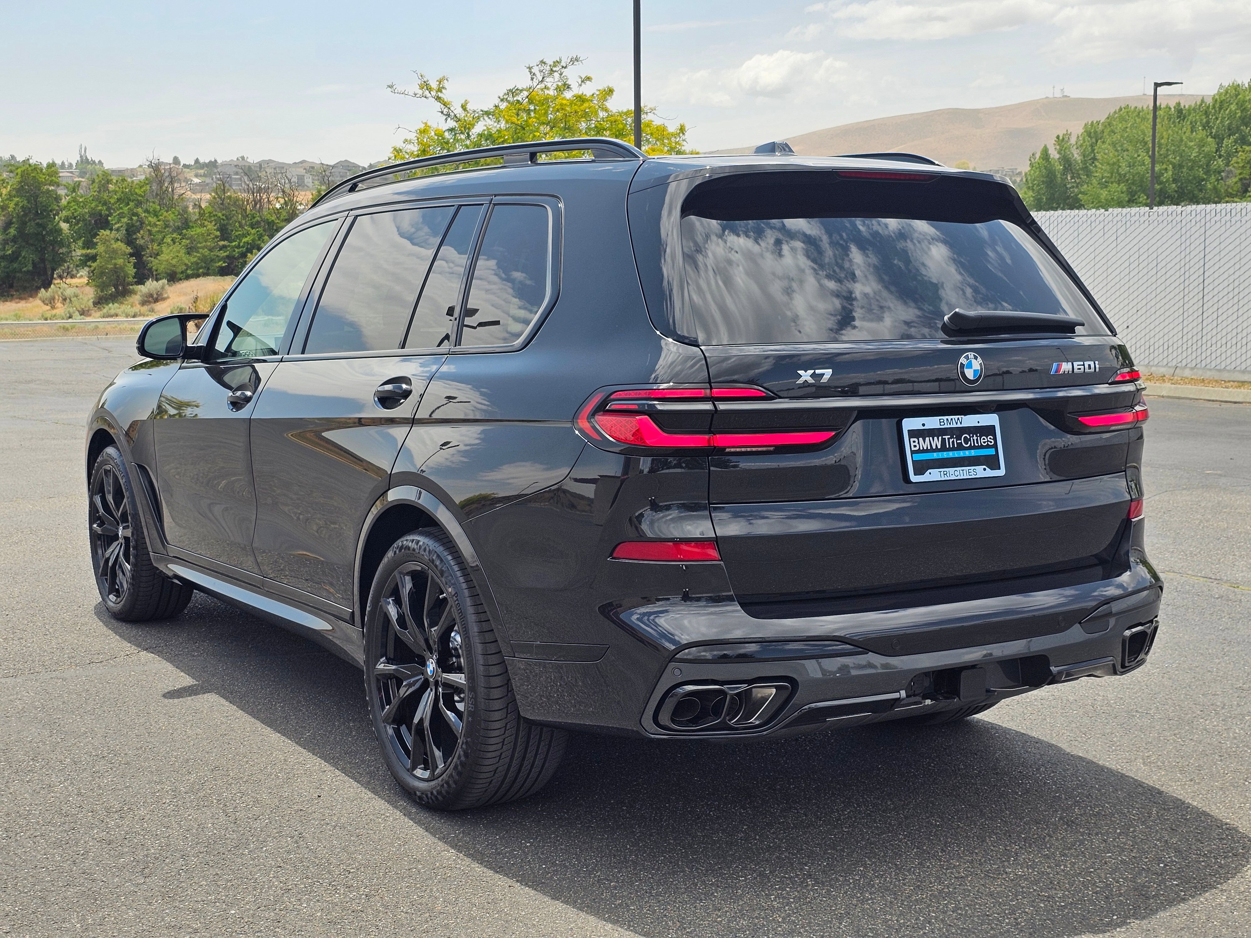 New 2026 Black Sapphire Metallic BMW M60i image 4