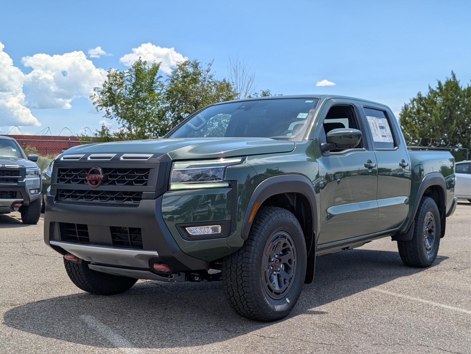 New 2025 Tactical Green Metallic Nissan Crew Cab PRO-4X® image 1