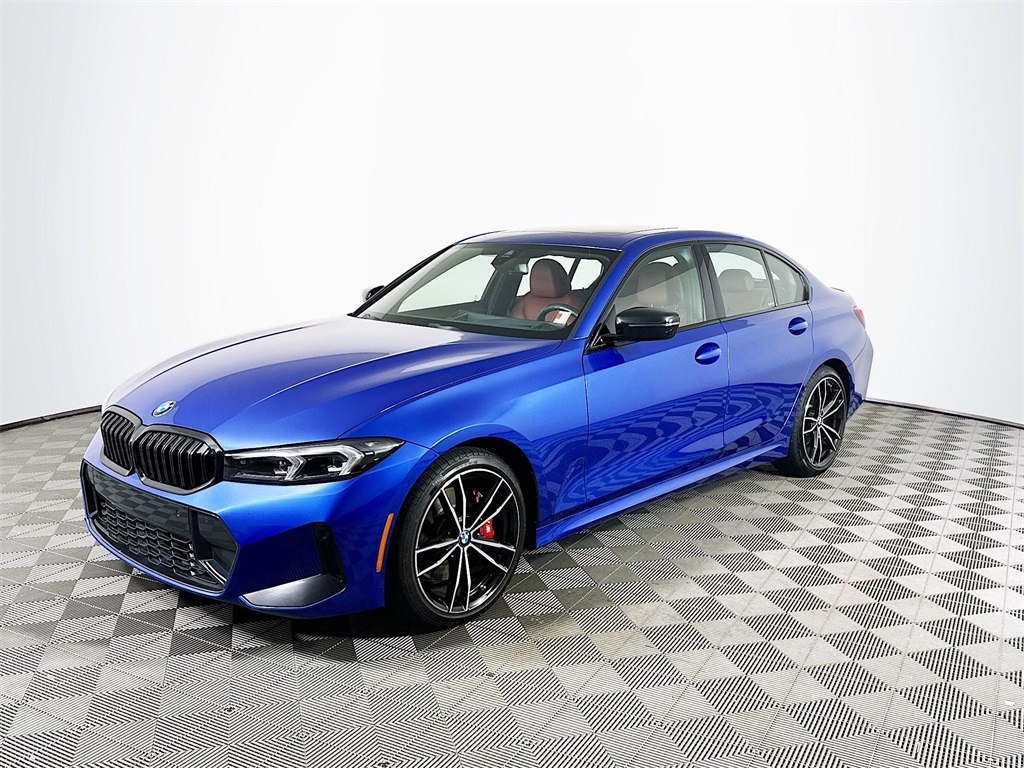 Used 2023 Blue Metallic BMW 330i xDrive image 1