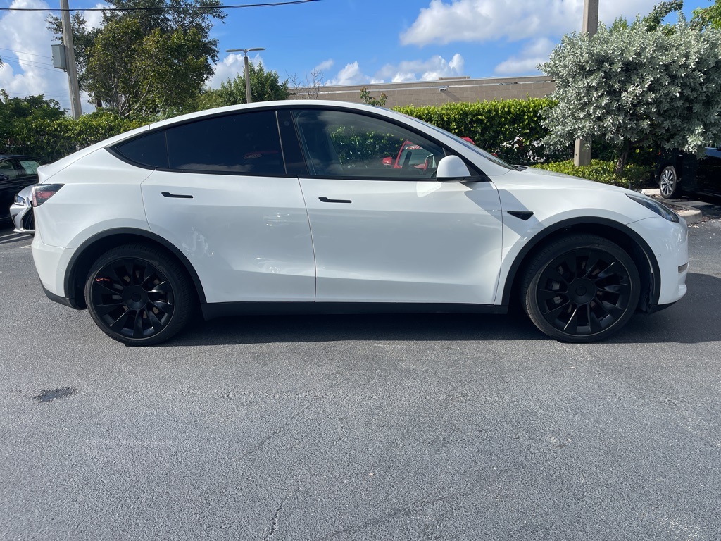 Used 2022 Tesla Model Y Long Range with VIN 7SAYGDEE1NA020762 for sale in Kansas City