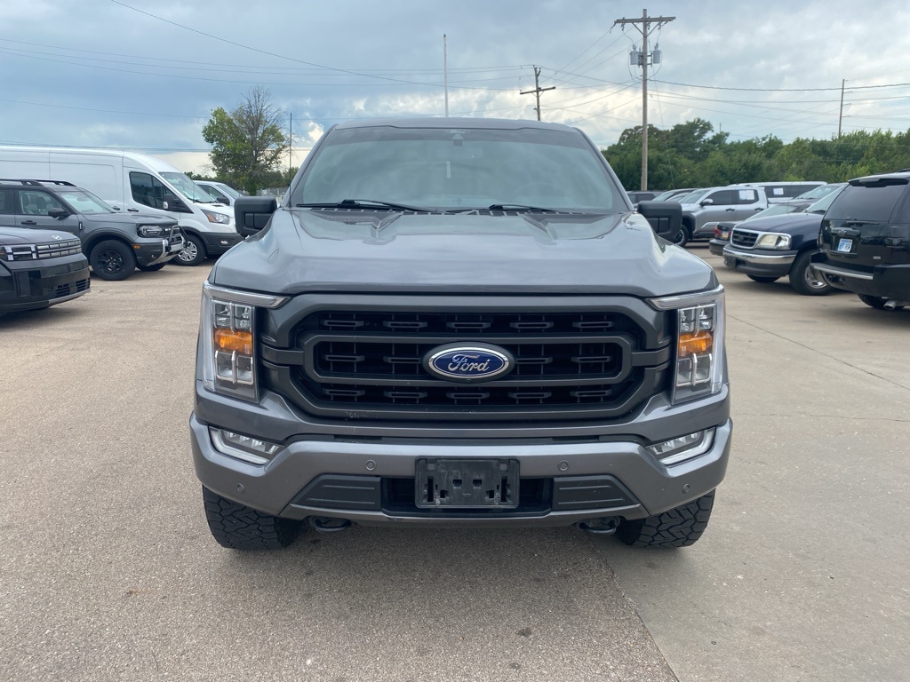 Used 2021 Ford F-150 XLT with VIN 1FTFW1E84MFB06547 for sale in Kansas City