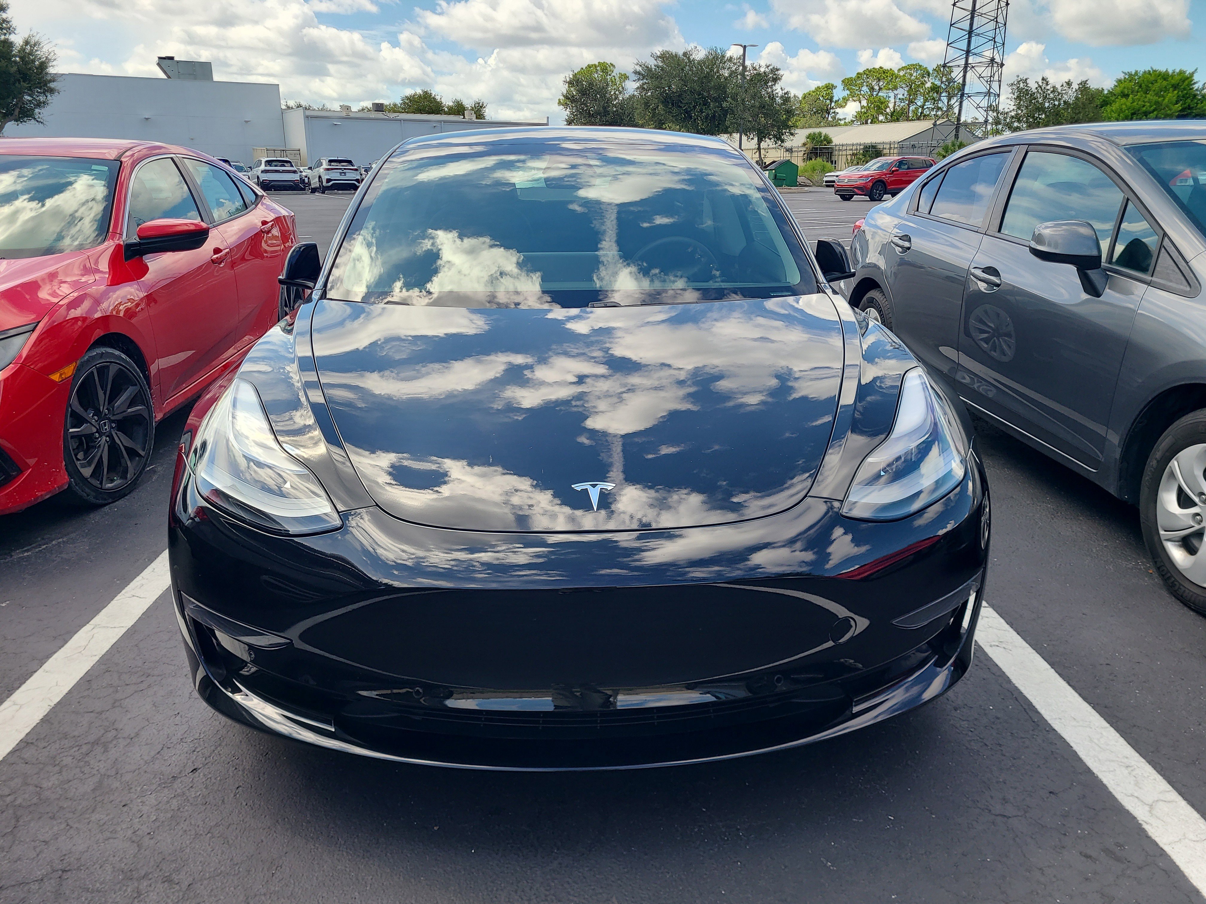 Used 2021 Tesla Model 3 Base with VIN 5YJ3E1EA8MF048777 for sale in Port Charlotte, FL