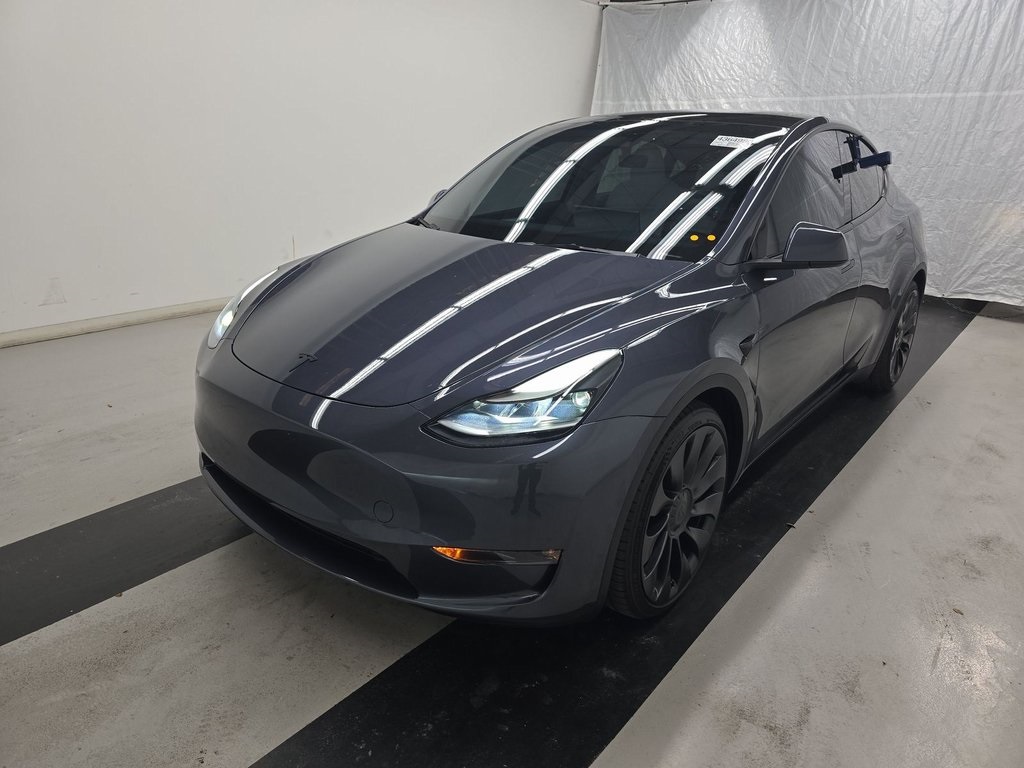 Used 2023 Tesla Model Y Performance with VIN 7SAYGDEF6PF704995 for sale in Kansas City