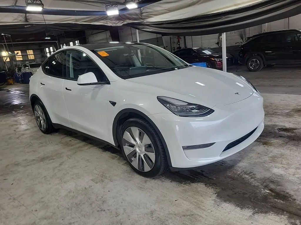 Used 2023 Tesla Model Y Long Range with VIN 7SAYGDEE4PA037882 for sale in Miami, FL
