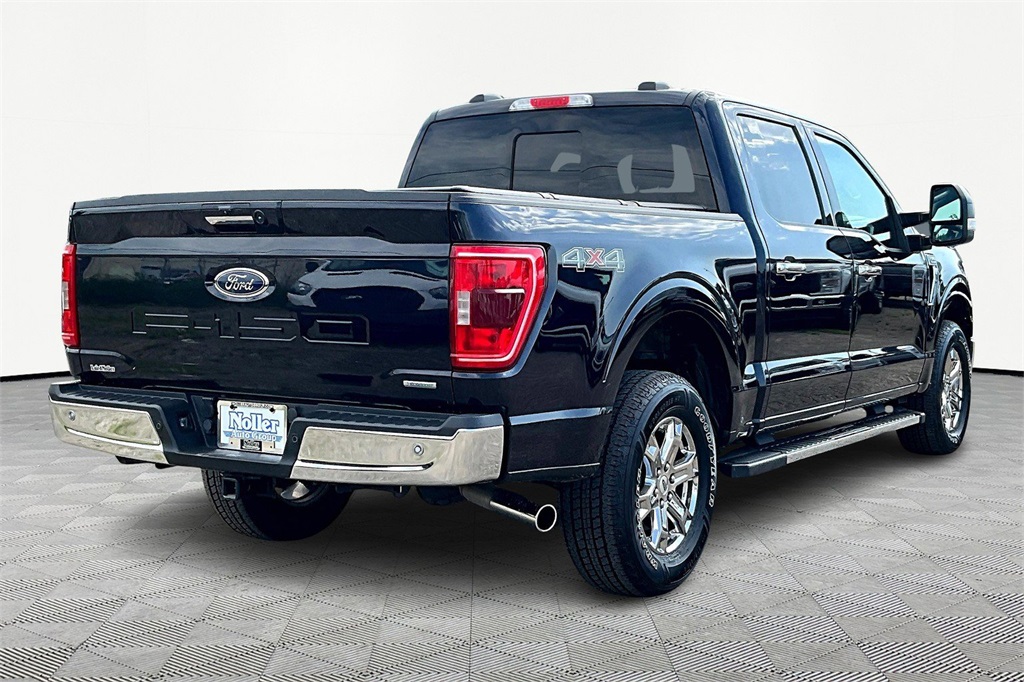 Used 2021 Ford F-150 XLT with VIN 1FTFW1E86MFD14509 for sale in Kansas City