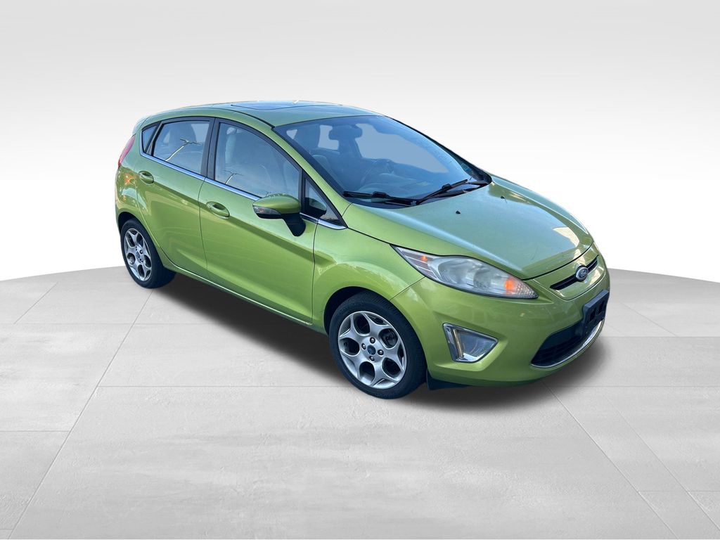 Used 2011 Ford Fiesta SES with VIN 3FADP4FJ7BM128939 for sale in Waukesha, WI