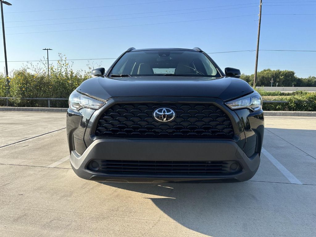 Used 2022 Toyota Corolla Cross LE with VIN 7MUCAAAG9NV029499 for sale in Brookshire, TX