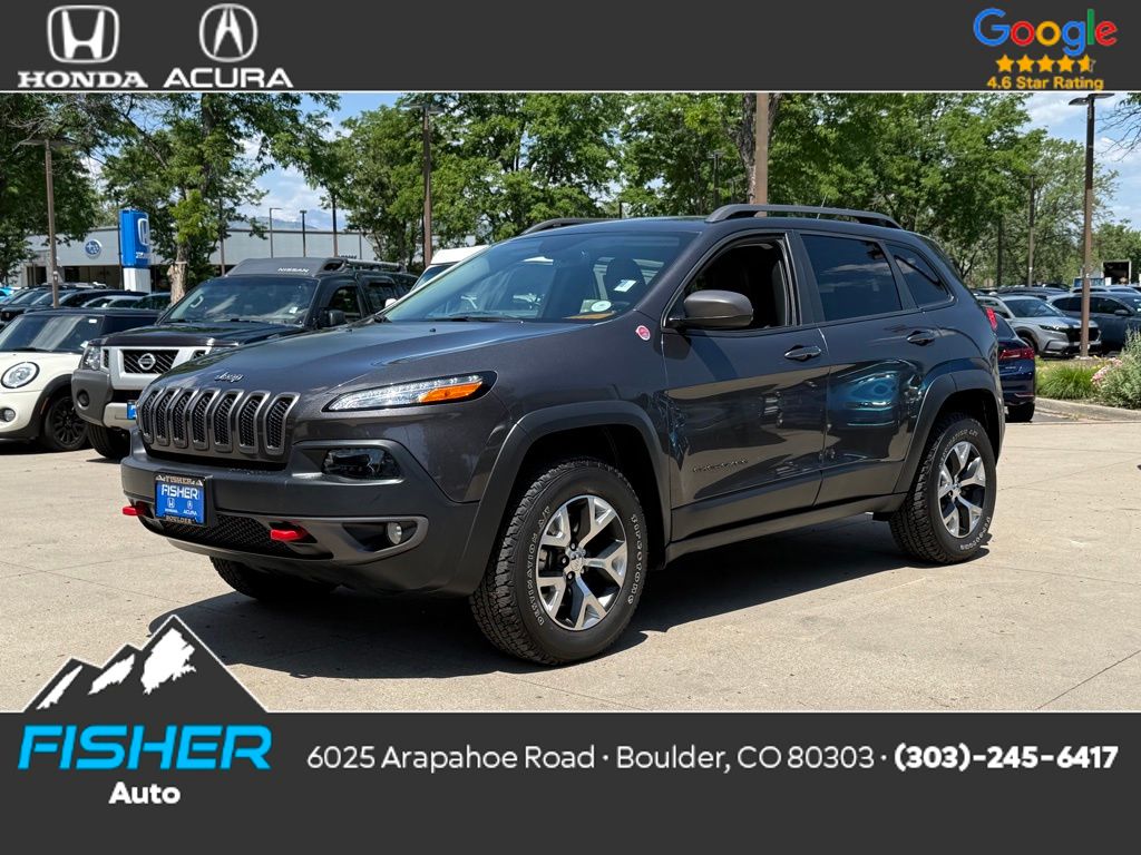 Used 2015 Granite Crystal Metallic Clearcoat Jeep Trailhawk image 1