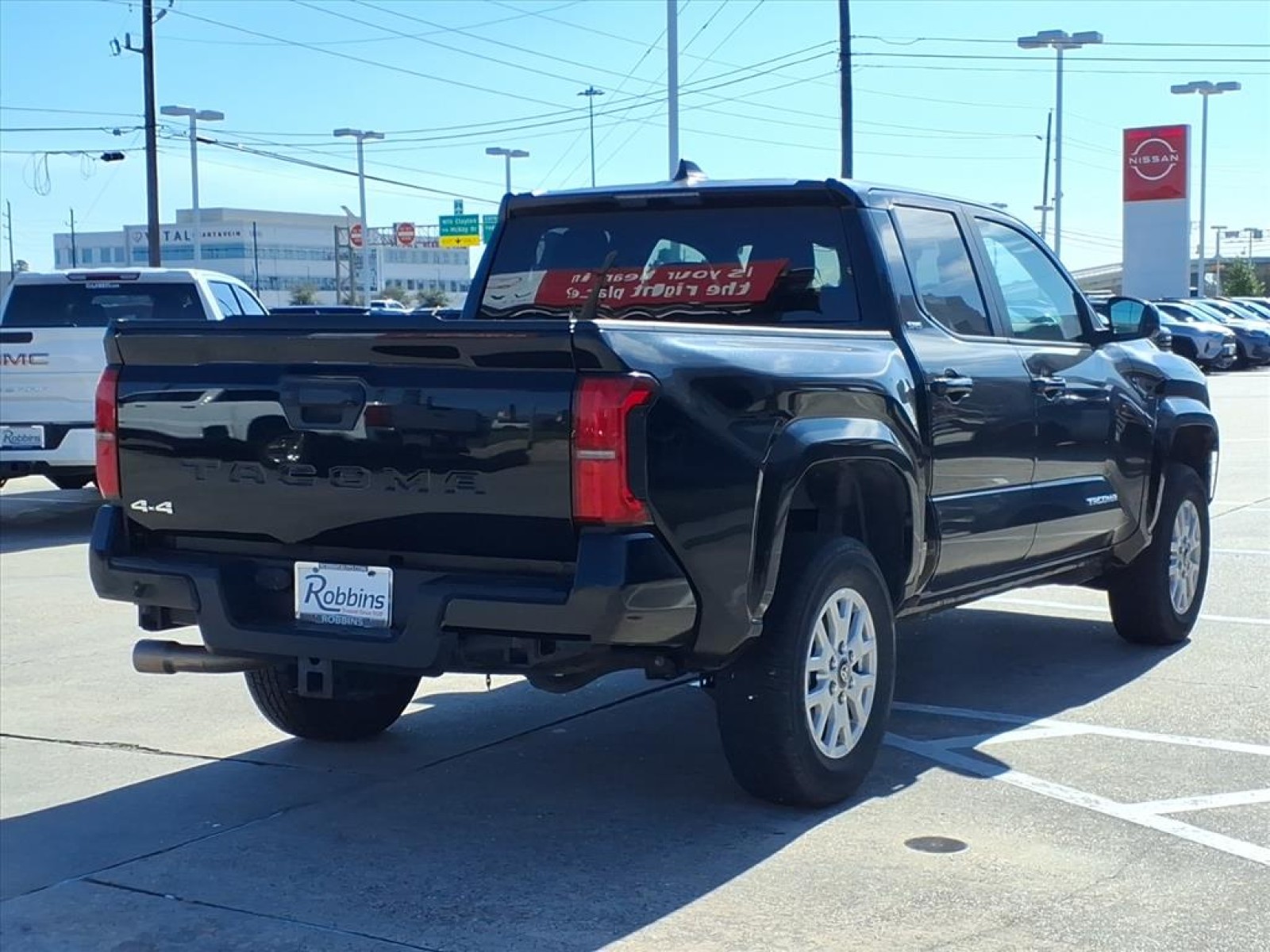 2024 Toyota Tacoma 4WD TRD Off Road Black at Robbins Nissan