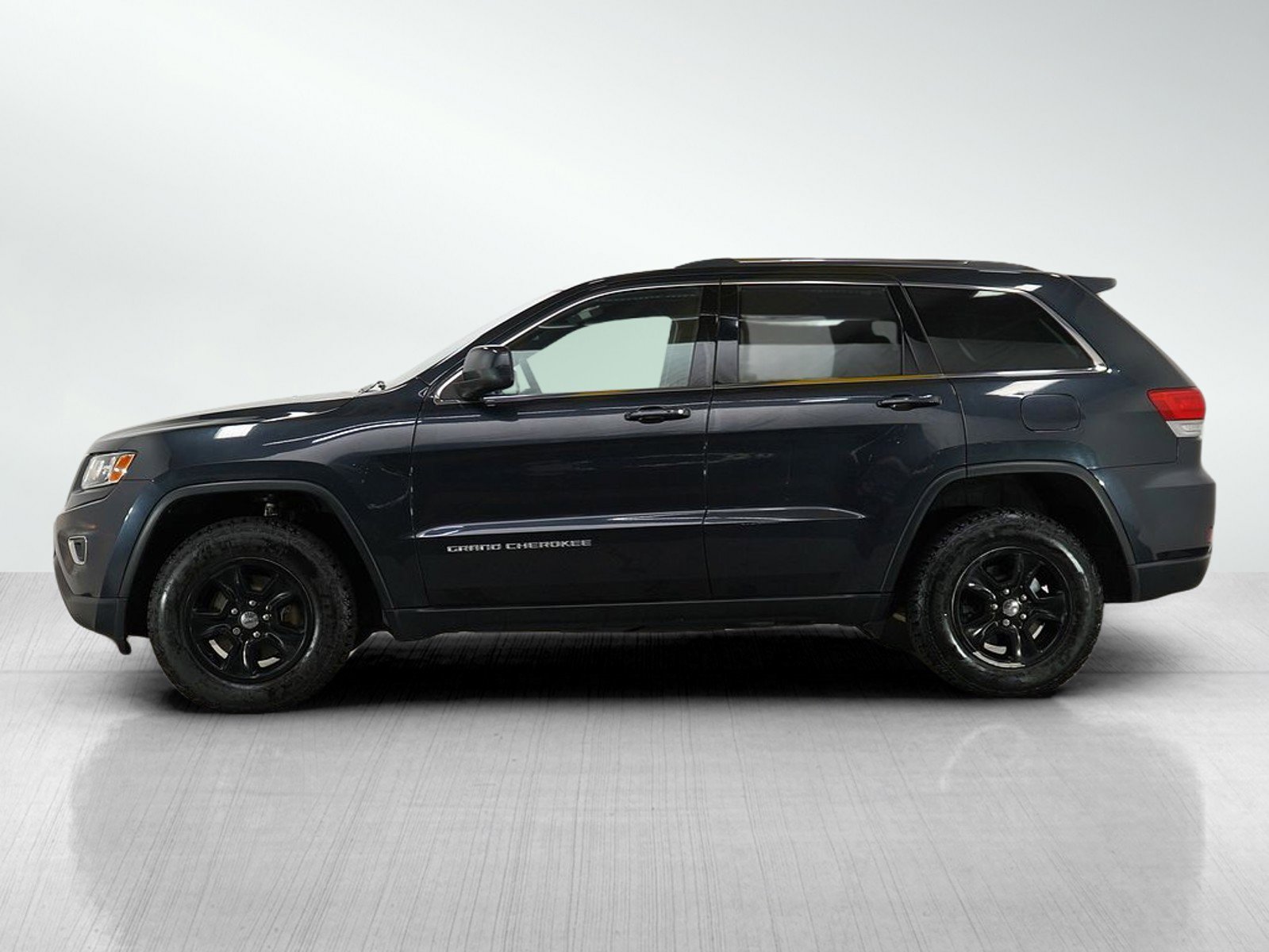 Used 2016 Jeep Grand Cherokee Laredo E with VIN 1C4RJFAG4GC435809 for sale in Minneapolis, Minnesota