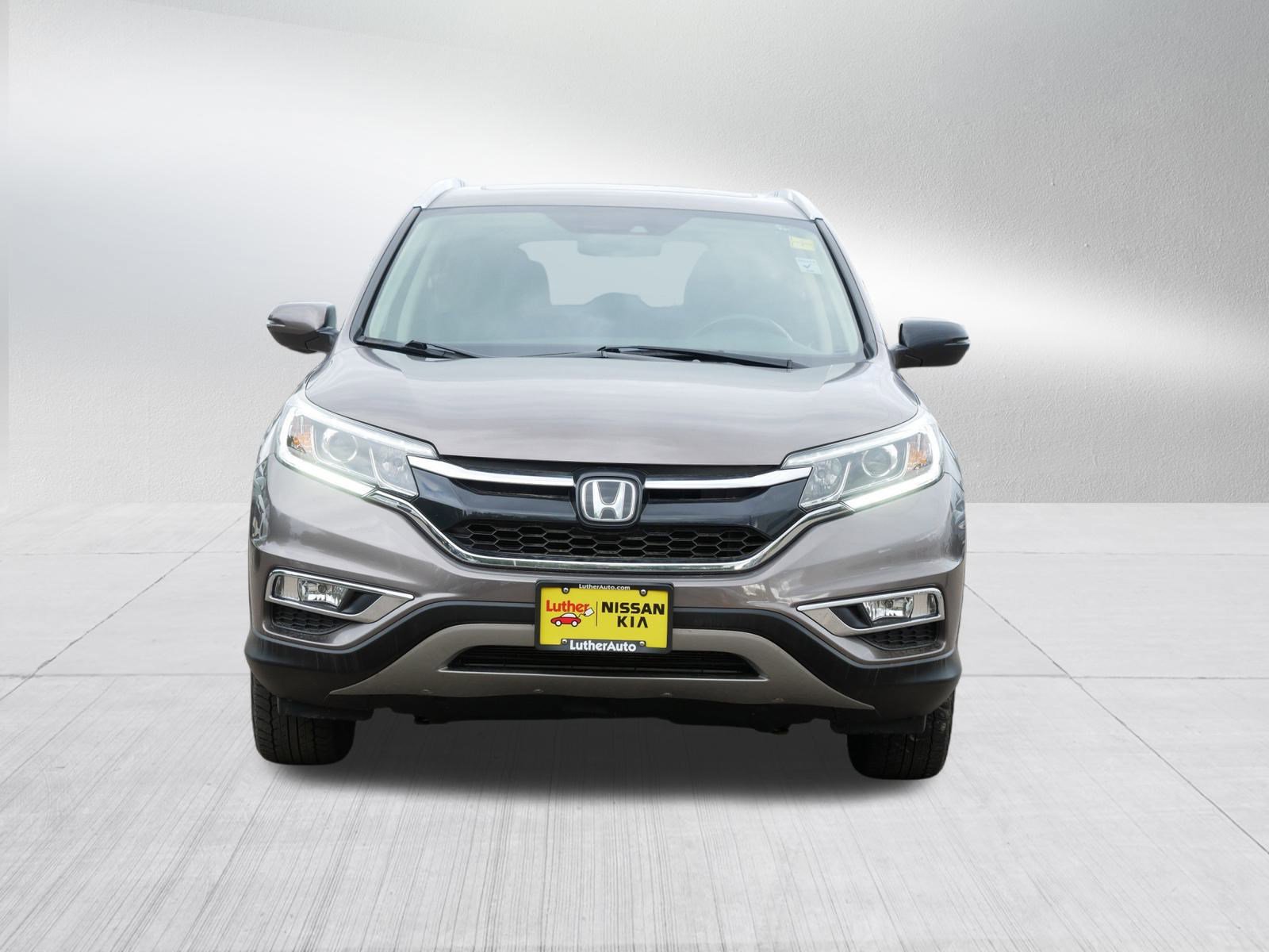 Used 2016 Honda CR-V Touring with VIN 5J6RM4H93GL134039 for sale in Inver Grove, Minnesota