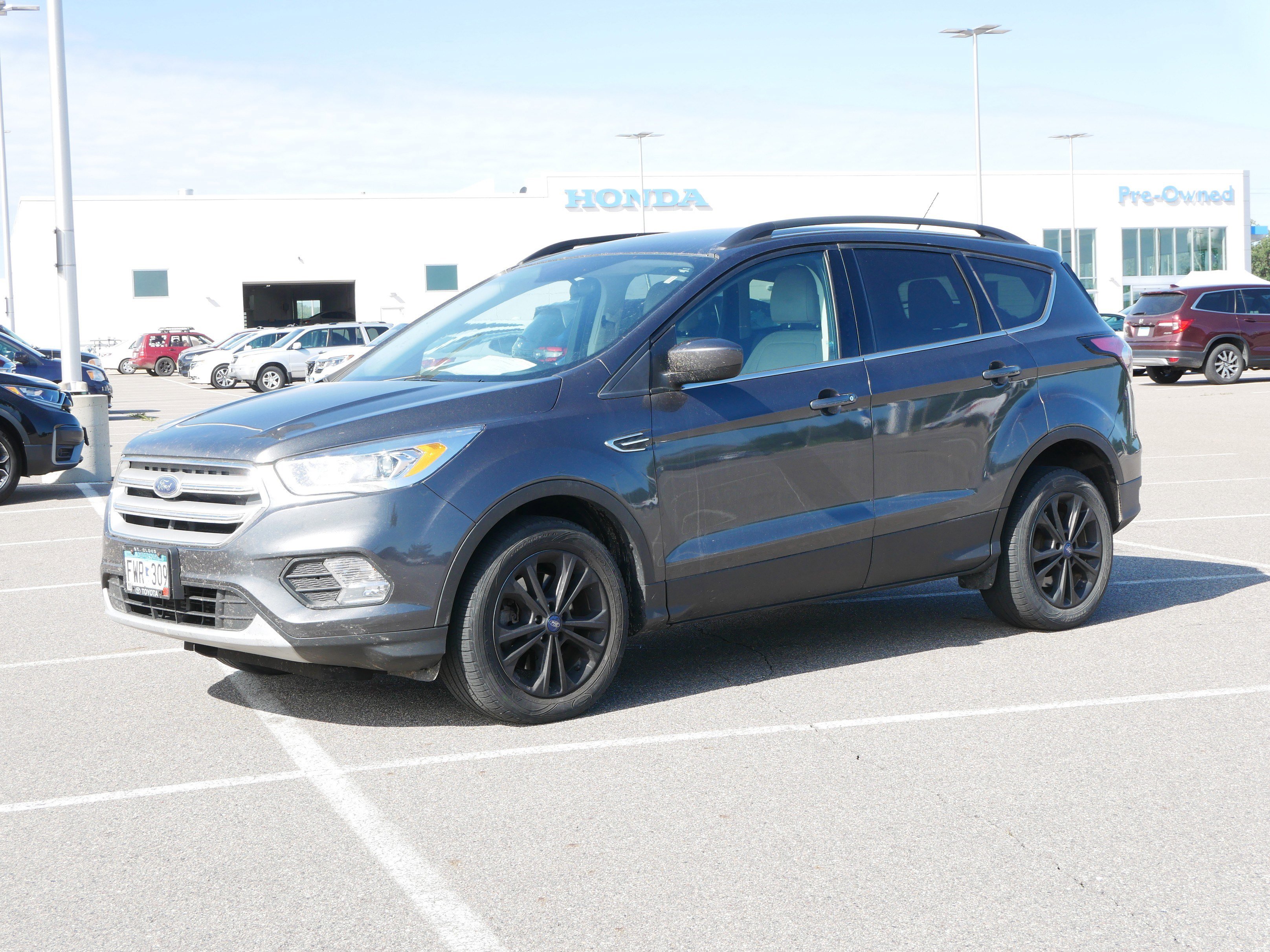 Used 2017 Ford Escape SE with VIN 1FMCU9G93HUE38487 for sale in Waite Park, Minnesota